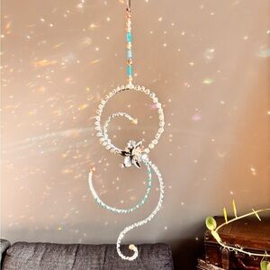 Crystal glass flower swirl suncatcher